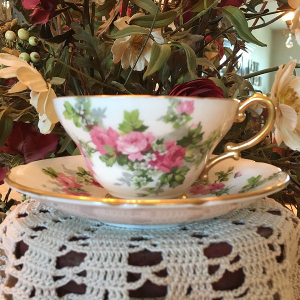 Vintage pink floral Stanley teacup and saucer with gold trim fine bone china made in England with crown symbol