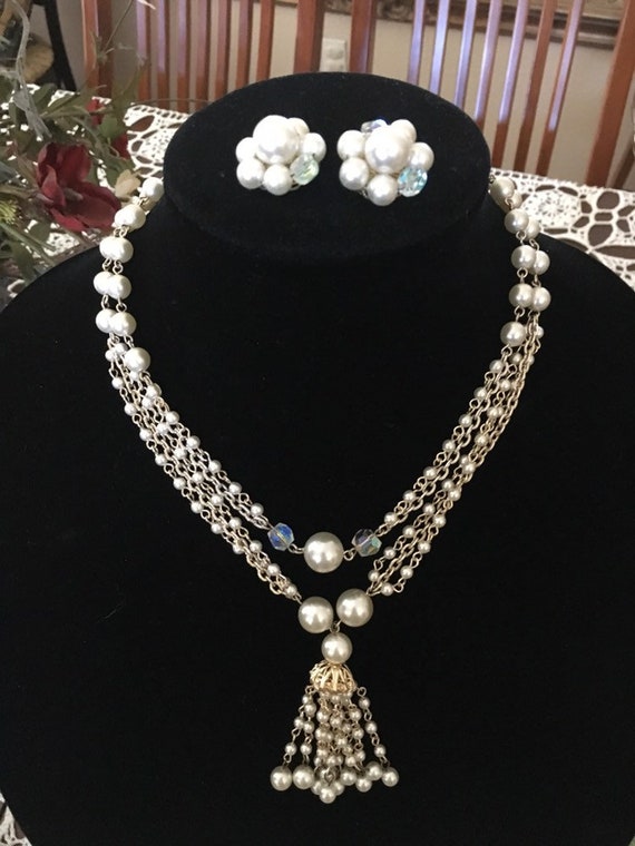 Sold at Auction: Japan three strand glass beaded vintage necklace