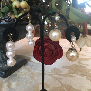 Two vintage faux pearl drop clip on earrings