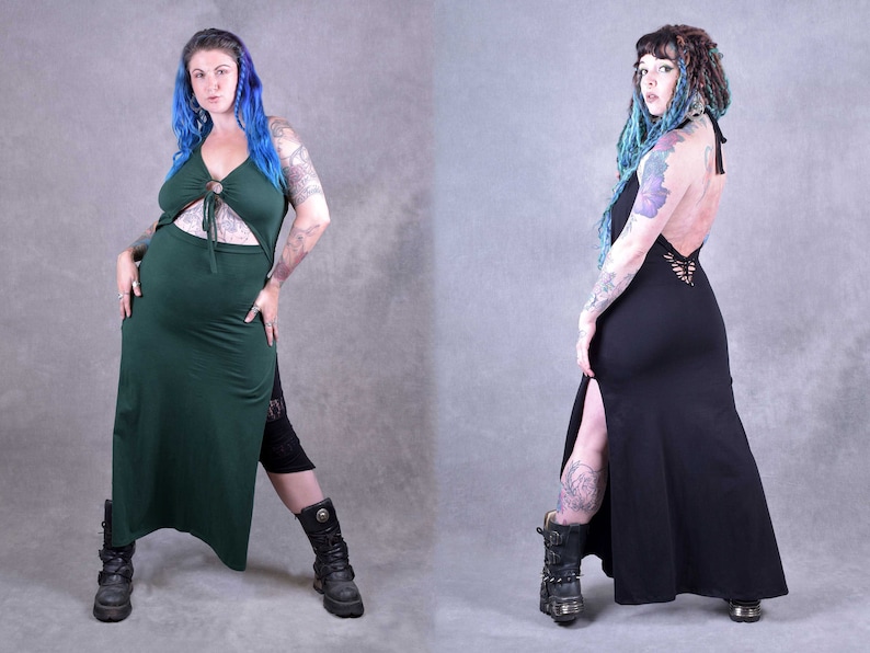 Two women wearing long, flowing dresses with side slits. The dress on the left is dark green and the dress on the right is black. Both dresses have a tie detail at the neckline.