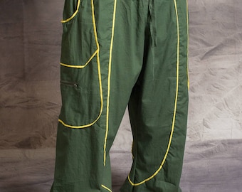 May include: Green pants with yellow stitching. The pants have a drawstring waist and large pockets on the sides.