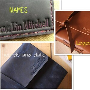 May include: Three leather-bound journals with personalized text. The first journal has the names "Anna Lin Mitchell" embossed in purple. The second journal has the text "Our Story" and the date "October 31, 2017" embossed in blue. The third journal has the text "Grimleathar" embossed in brown. All three journals have the word "Logos" embossed in yellow.