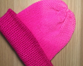 Handmade Beanie that has been hand-dyed in a ombre Neon Pink. 100% Australian superwash wool, This beanie will fit teen through to Adult.