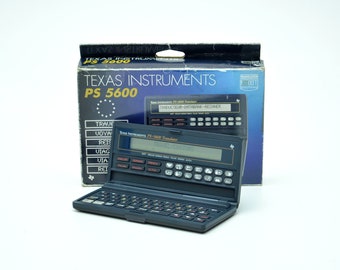 Texas Instruments PS 5600 digital pocket translator 90s 1992