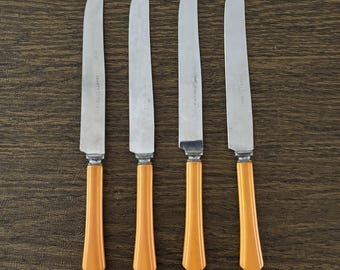 Set of 4 Vintage Butterscotch Bakelite Knives
