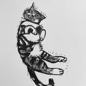 Cat lying down linocut print