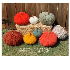 May include: Knitting pattern for a set of eight knitted pumpkins in various colors, including red, orange, yellow, green, and white. The pumpkins are arranged on a bale of hay in front of a wooden fence. The text "Knitting Pattern" is visible at the bottom of the image.