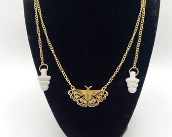 Sensory earplug necklace with lunar moth, loop earplug sensory jewelry, accessible accessory