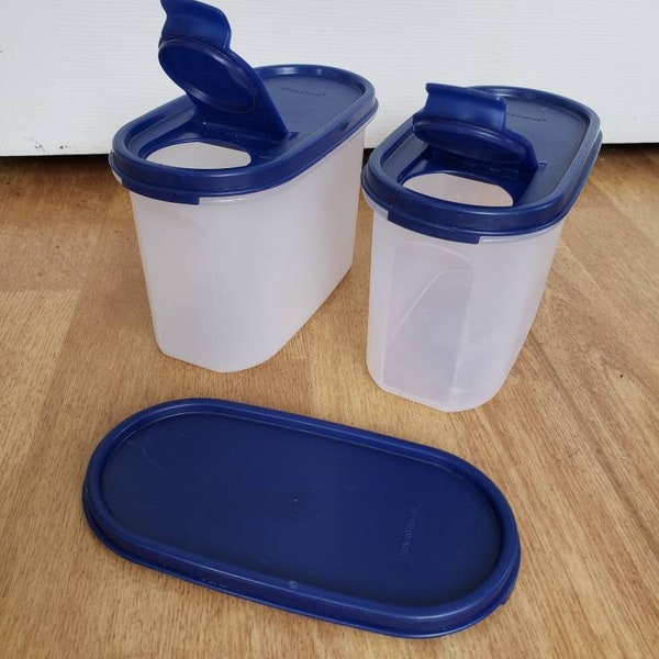 Tupperware  cereal store and pour spout measuring cup 4 3/4 cup you get 2 and extra lid