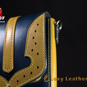 Close-up of the decorative perforated yellow overlay on a blue leather bag. DIY leathercraft blueprint and template for manual crafting or laser cutting