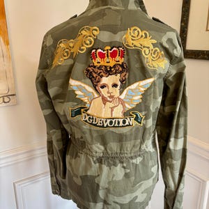 Custom Woman’s Camo green jacket with embellishments and patches, cherub, size Medium