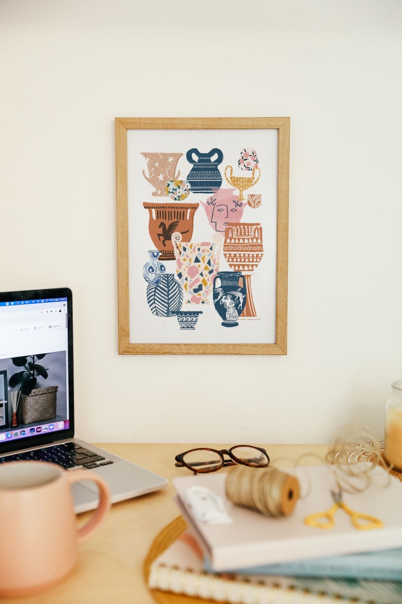 May include: A framed print of a colorful illustration featuring various stylized vases with geometric patterns and a horse design. The vases are in shades of blue, pink, orange, and brown.