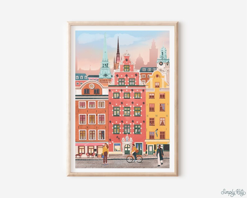 Pode incluir: Uma ilustra&ccedil;&atilde;o colorida de uma cidade com edif&iacute;cios altos e um campan&aacute;rio de igreja. Os edif&iacute;cios s&atilde;o pintados em tons de rosa, amarelo e azul. H&aacute; pessoas caminhando na rua abaixo.