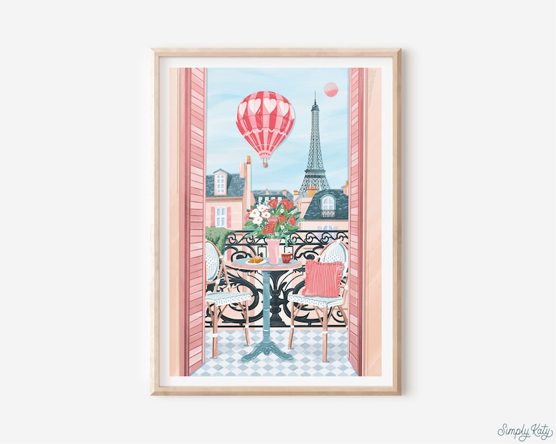 May include: A pink and white hot air balloon floats over a Parisian balcony with a view of the Eiffel Tower. Two chairs and a table with a cup of coffee and pastries are set on the balcony. The balcony is decorated with pink flowers.