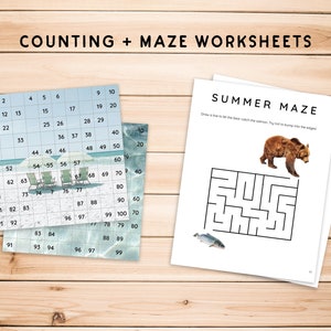 May include: A printable worksheet set for kids featuring a summer-themed maze and a counting activity. The maze features a brown bear trying to catch a salmon fish. The counting activity features a grid of numbers from 1 to 100 with beach-themed illustrations.
