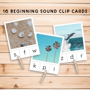 May include: A set of 16 beginning sound clip cards featuring images of seashells, palm trees, and a dolphin jumping out of the water. Each card has three letters printed on it, with one letter highlighted in bold.