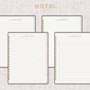 May include: Four notebooks with different interior page designs: lined, dotted, and blank. The notebooks are cream-colored with gold spiral binding and the text "the NOTES" in gold. The notebooks are arranged on a textured, light beige background.