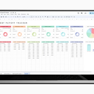 May include: A laptop screen displaying a spreadsheet with a debt payoff tracker. The spreadsheet includes a debt distribution chart with a pie chart and a total rapid progress bar. The spreadsheet is titled "Debt Payoff Tracker".