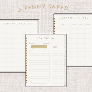 May include: Three spiral-bound notebooks with beige pages and gold accents. The notebooks are labeled "Debt Snowball Tracker", "Yearly Savings Goals", and "Savings Tracker". The text "A Penny Saved..." is at the top.