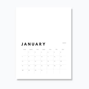 May include: A white wall calendar page for January 2027 with black sans-serif text. The month name is printed in large bold letters at the top, followed by a grid of days of the week and numbered dates from 1 to 31. The design is clean and simple.