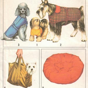 May include: Simplicity 8802 sewing pattern envelope featuring illustrations of dogs wearing a blue coat, a yellow t-shirt, and a red plaid coat. Also includes a dog in a tan tote bag and a round orange pet bed. Text reads T-SHIRT SIZED FOR STRETCH KNITS.