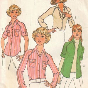 May include: Vintage Simplicity sewing pattern 7912 featuring blouse designs. The illustration shows various blouse styles in pink striped, white, and green. The pattern includes the text "Simplicity" and "SIZE 10 MISS".