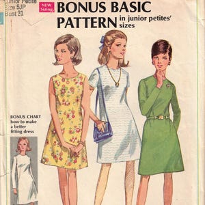 May include: Vintage Simplicity sewing pattern for junior petites. The pattern features three dress designs, including a floral print, a white textured dress, and a green dress with a belt. The pattern includes sizing information and instructions for a better fit.