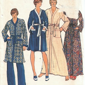 May include: A sewing pattern for three robes. The pattern is for a blue robe with white trim, a cream robe with white trim, and a red and blue patterned robe. The pattern number is 4158 and the price is $1.25.