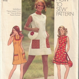 May include: A vintage sewing pattern for a dress, Simplicity pattern number 9879. The pattern is for sizes 10-18 and includes instructions for making a dress with patch pockets. The pattern is titled 'How to Sew' and is priced at 85 cents.
