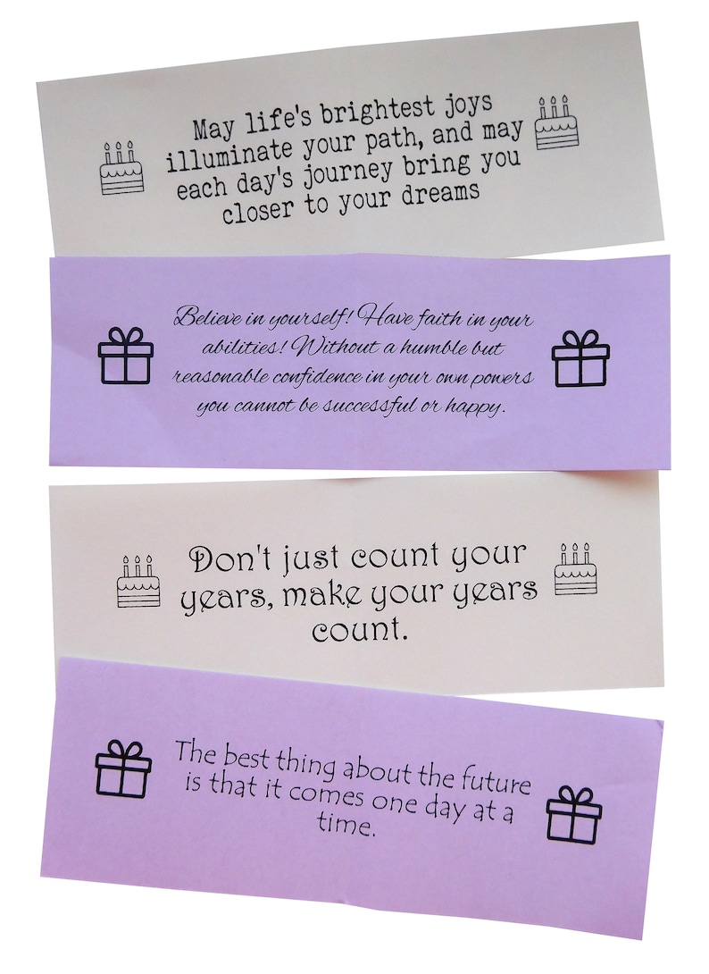 May include: Four colorful cards with inspirational quotes and small illustrations. The quotes are: "May life's brightest joys illuminate your path, and may each day's journey bring you closer to your dreams", "Believe in yourself! Have faith in your abilities! Without a humble but reasonable confidence in your own powers you cannot be successful or happy.", "Don't just count your years, make your years count.", and "The best thing about the future is that it comes one day at a time."