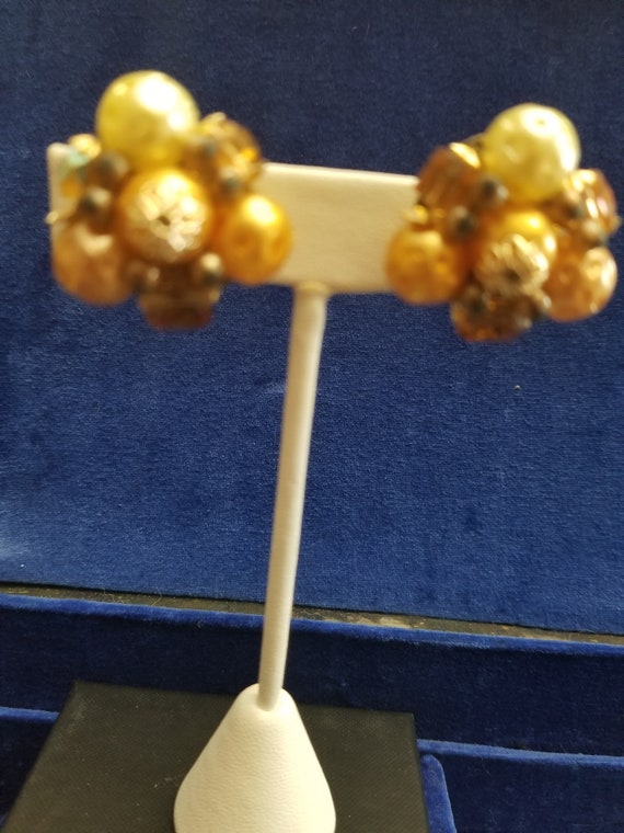 Vintage Amber color clip-ons with gold tone settin
