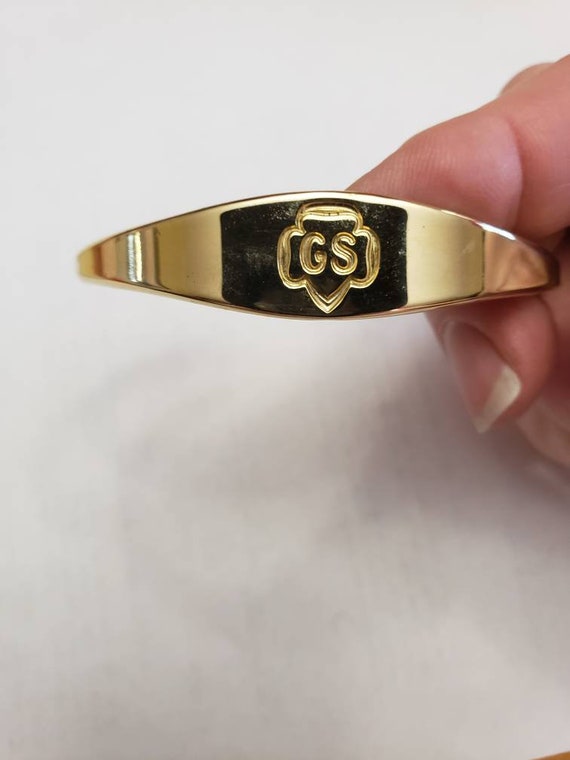 Vintage Girl Scout cuff bracelet. Gem