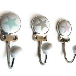 Perchero estrella de cerámica niquelada
