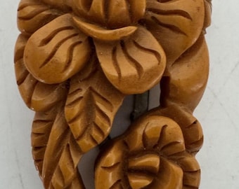 Vintage Butterscotch Deeply Carved Bakelite Flower Dress Clip Floral Tropical