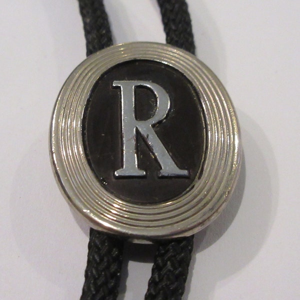 Initial R Bolo Tie-Vintage Swank Silver Tone "R' Initial on Silver Tone Robert Robin Oval Bolo Tie IC Lot 25