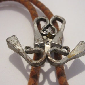 Cutout Silver Tone Bolo Tie: Cowgirl Costume Necktie with Suede Cord