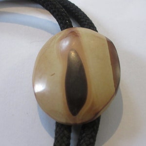 Handcrafted Wood Swirl Bolo Tie: Beige Brown Oval