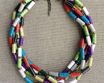 Multi-strand glittered paper bead necklace