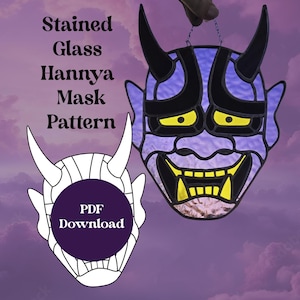 Puede incluir: Un patrón de máscara Hannya de vidrio coloreado en morado, negro y amarillo. El patrón es para descargar en PDF. Patrón de máscara Hannya de vidrio coloreado.