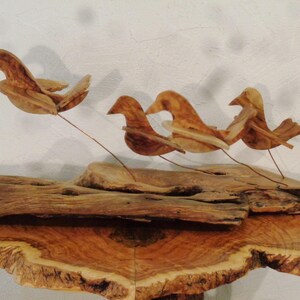 Doves of peace ,olive wood sculpture, birds in flight , shivering on copper wire struts image 1