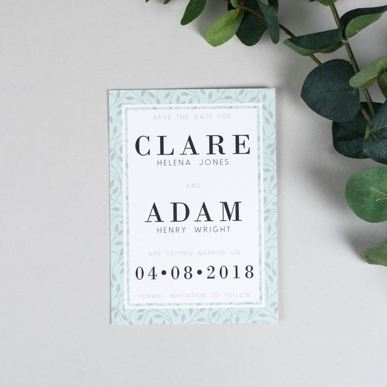 Save the Date Swirling Greenery Vine Leaves and mint background Clare