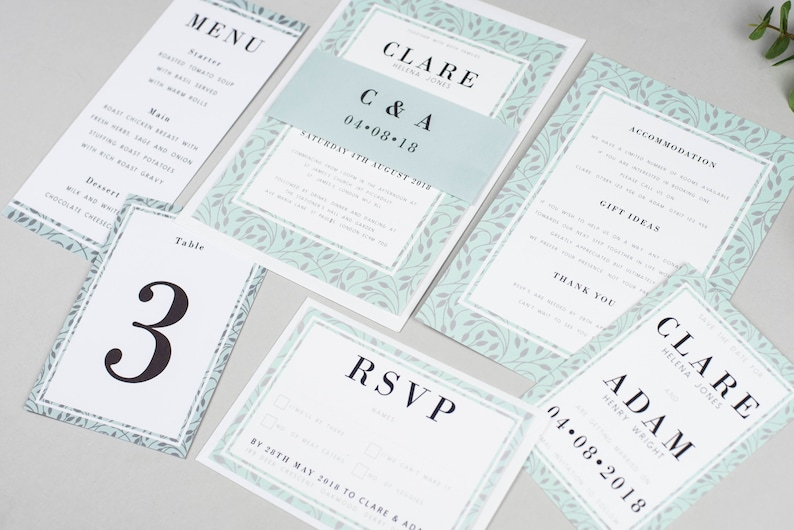 Save the Date Swirling Greenery Vine Leaves and mint background Clare