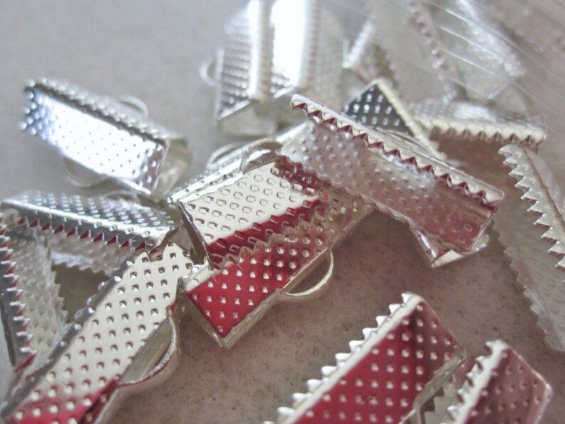 50-16mm Silver and Bronze Ribbon Crimp Ends with Loop.