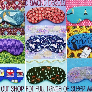 May include: A collage of nine colorful sleep masks with various patterns, including birds, flowers, and geometric designs. The text "DIAMOND DESOLA" and "VISIT OUR SHOP FOR FULL RANGE OF SLEEP MASKS" is visible in the image.