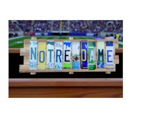 Notre Dame Cut License Plate Strip sign