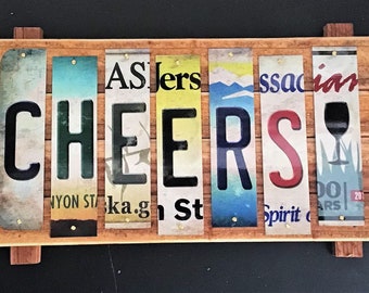 Cheers Cut License Plate Strip sign