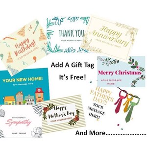 May include: A collection of gift tags with various designs and messages, including "Happy Birthday," "Thank You," and "Happy Anniversary." The tags are in different colors and styles, with text that reads "Add A Gift Tag, It's Free!" and "And More..."