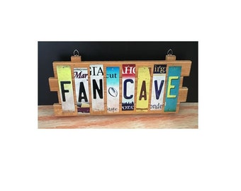 Fan Cave Cut License Plate Strip Sign