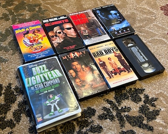 Various VHS tapes (Mummy Returns/Big Daddy/Bad Boys/Bandits/101 Dalmatians)