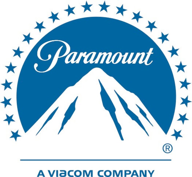 May include: A blue and white logo for Paramount Pictures, a Viacom Company. The logo features a mountain peak with a circle of stars around it. The word "Paramount" is written in a stylized font above the mountain.